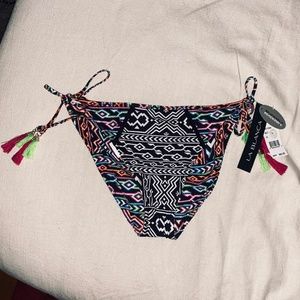 NWT La Blanca 10 Reversible String Aztec Multi Colored Bikini Bottom $68